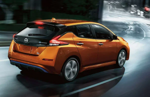 Orange Nissan LEAF in Rockville, MD