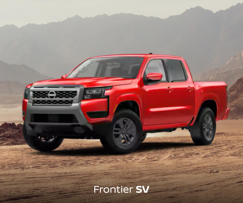 Front three-quarter view of a red Nissan Frontier SV in a desert landscape with mountains.